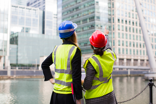 Ladies looking at a construction site